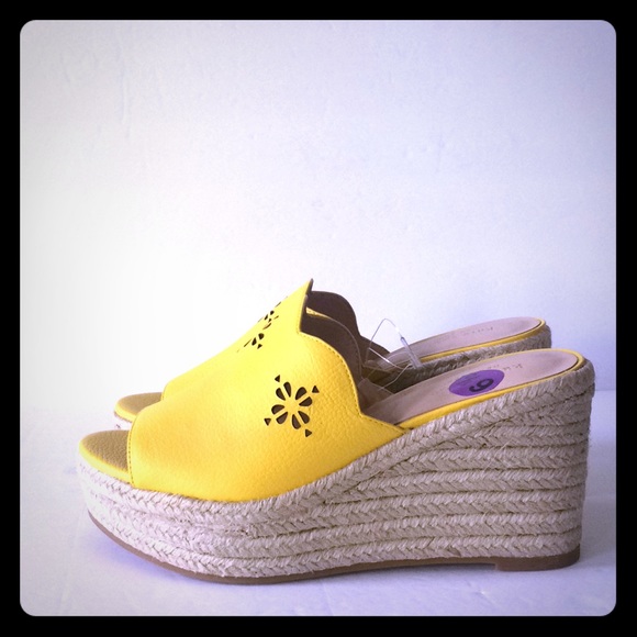 kate spade Shoes - Kate Spade yellow perforated scallop platform